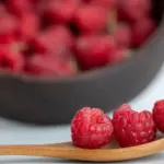 sweet raspberries growing in garden