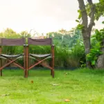 cozy backyard garden with seating and plants