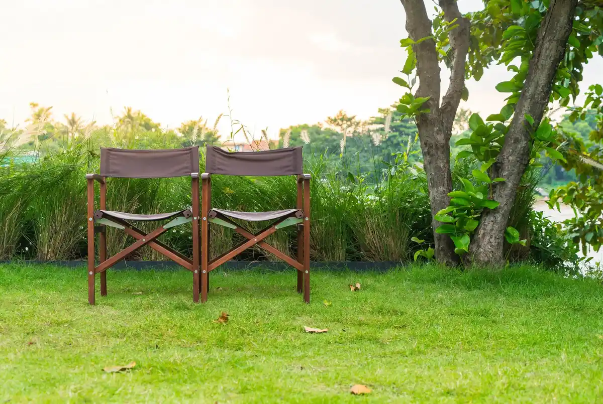 cozy backyard garden with seating and plants